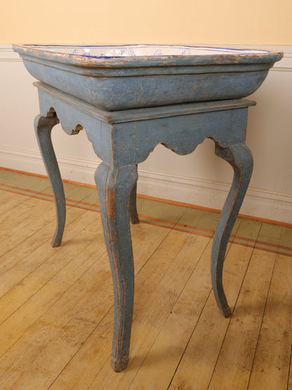 Side view of 18th Century Rococo Faience Table