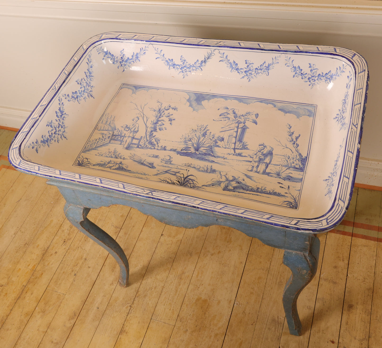 18th Century Rococo Faience Table depicting a tea scene in a garden setting