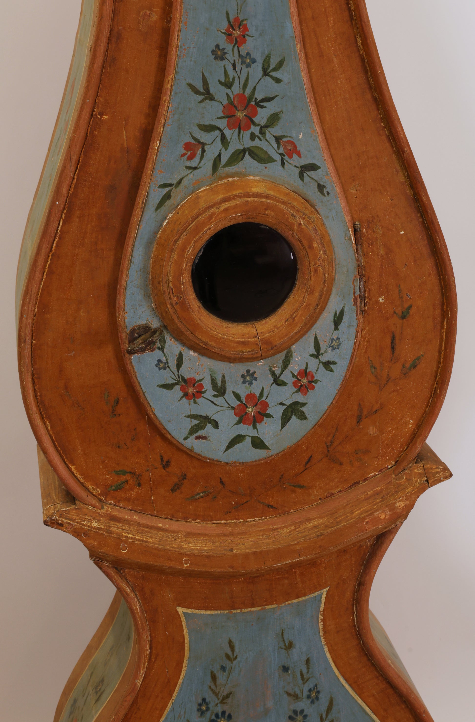 Painted flowers on a Swedish antique clock.