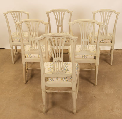 Back view of a six Gustavian antique chairs.