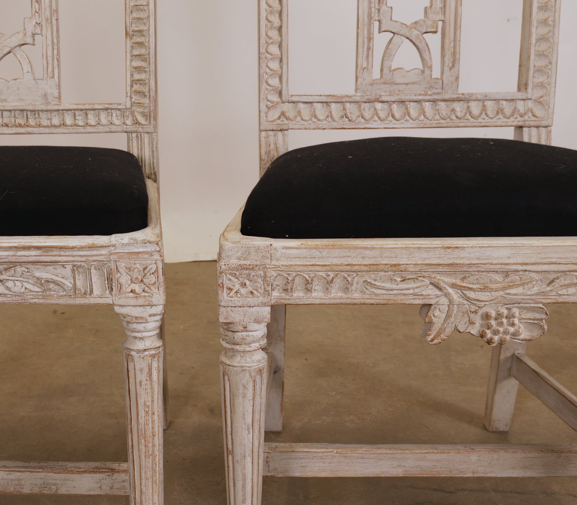 Carved details on Swedish Gustavian chairs.