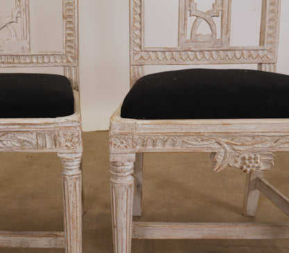 Carved details on Swedish Gustavian chairs.
