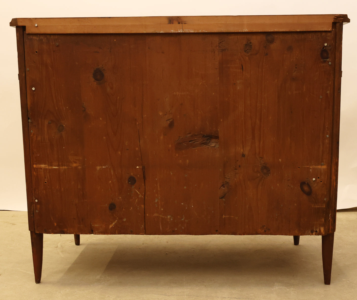 The back of an antique 18th century Gustavian commode.
