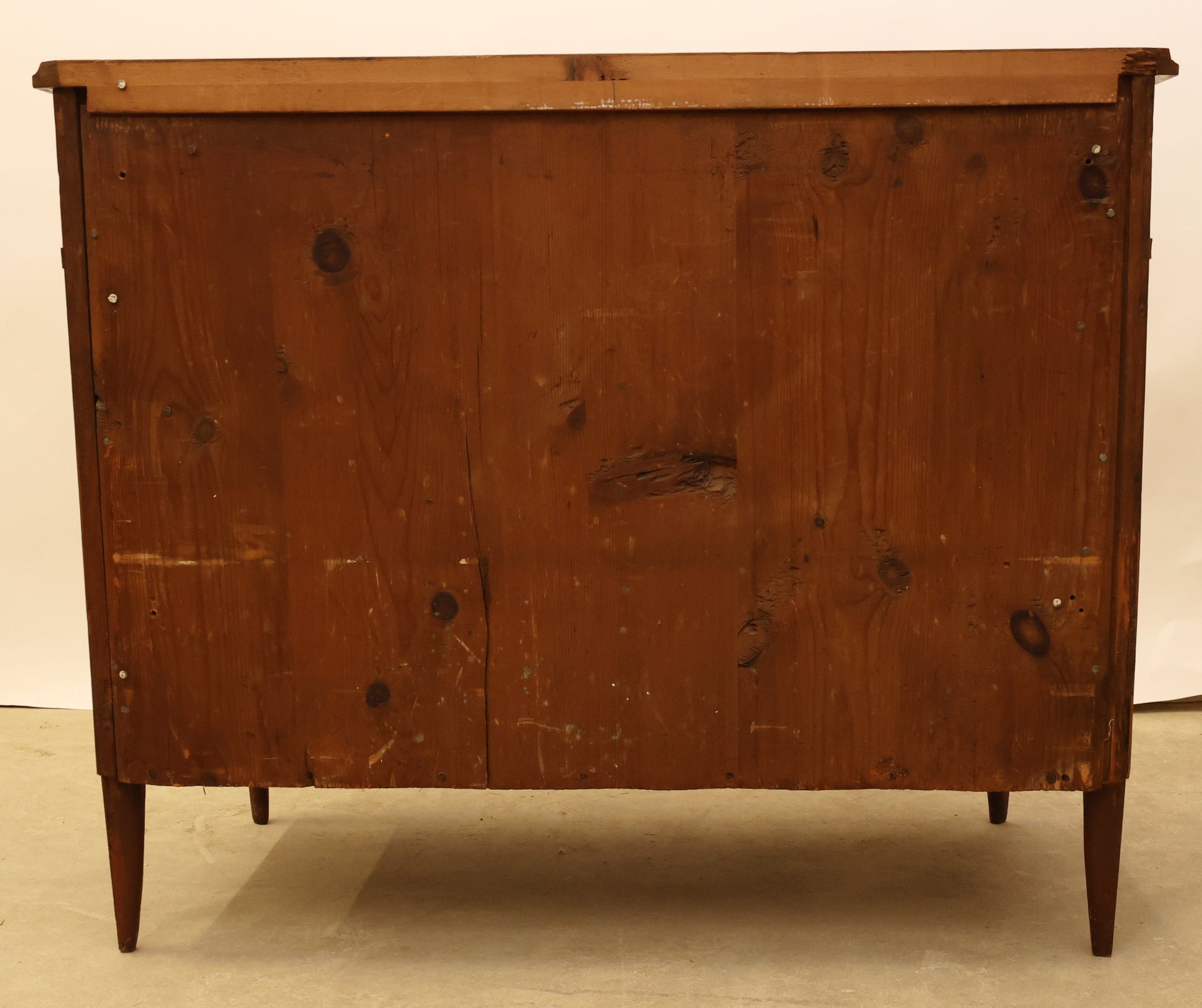 The back of an antique 18th century Gustavian commode.