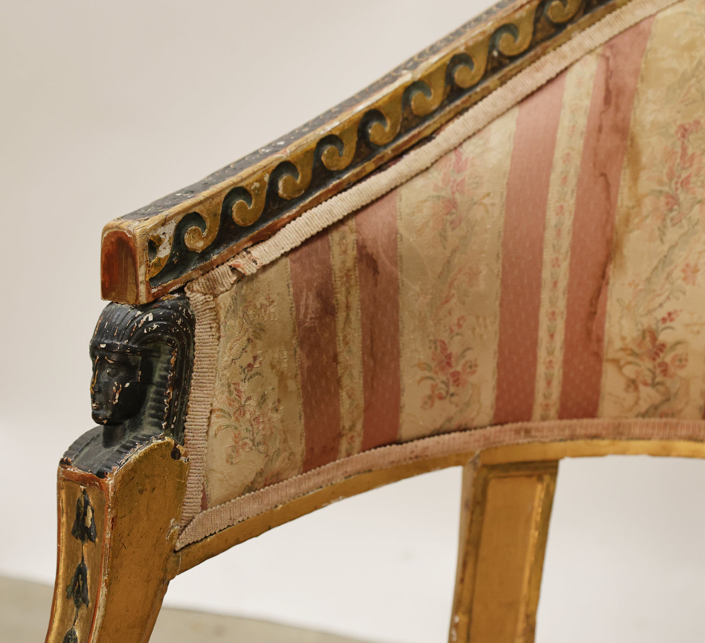 Gilded Gustavian tub chair in the Egyptian Revival style. 