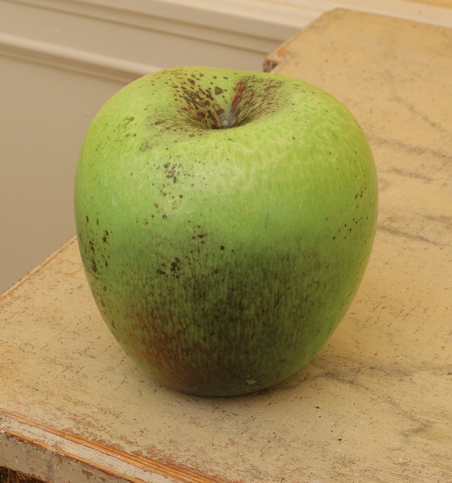 Green apple in high-fired faience by Hans Hedberg