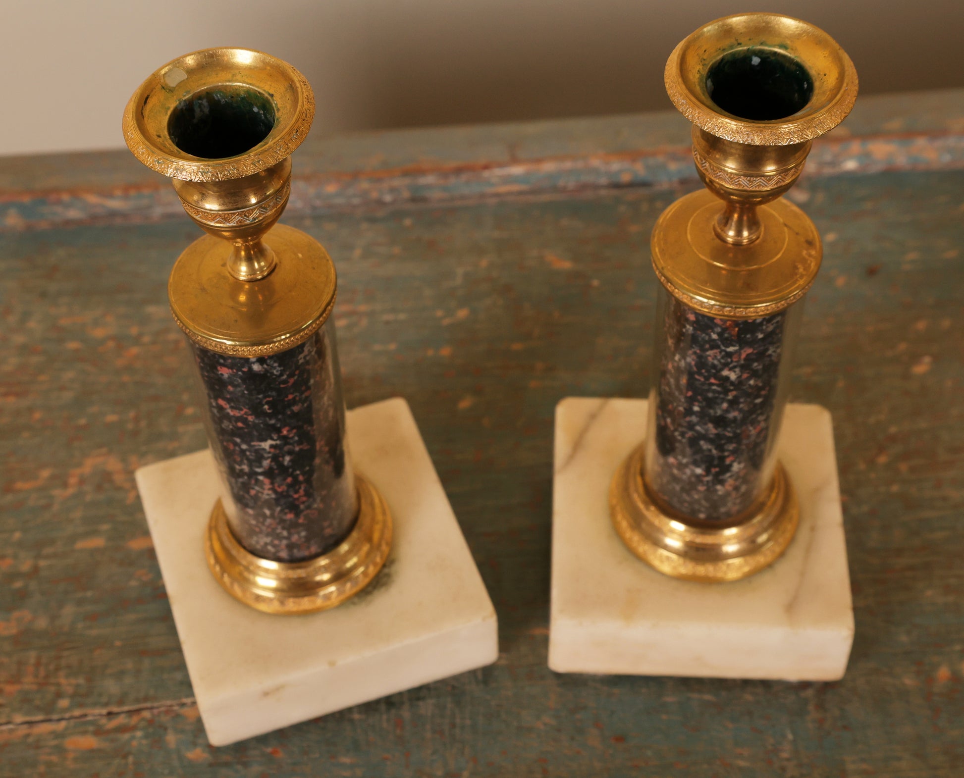 Above view of a pair of late-gustavian candlesticks.