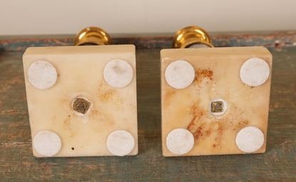Underneath a pair of late-gustavian candlesticks.