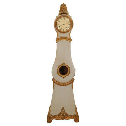 Late 18th Century Rococo Antique Grandfather Clock signed Hans Wessman featuring rich gilded carvings in typical rococo forms with white background.