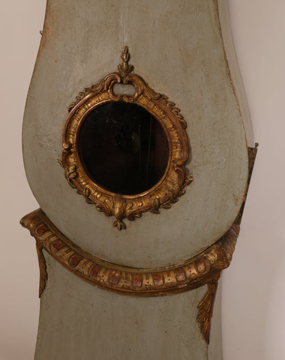 Close up of the body of an 18th Century Rococo Grandfather Clock signed Hans Wessman with rich gilded carvings in typical Rococo forms.