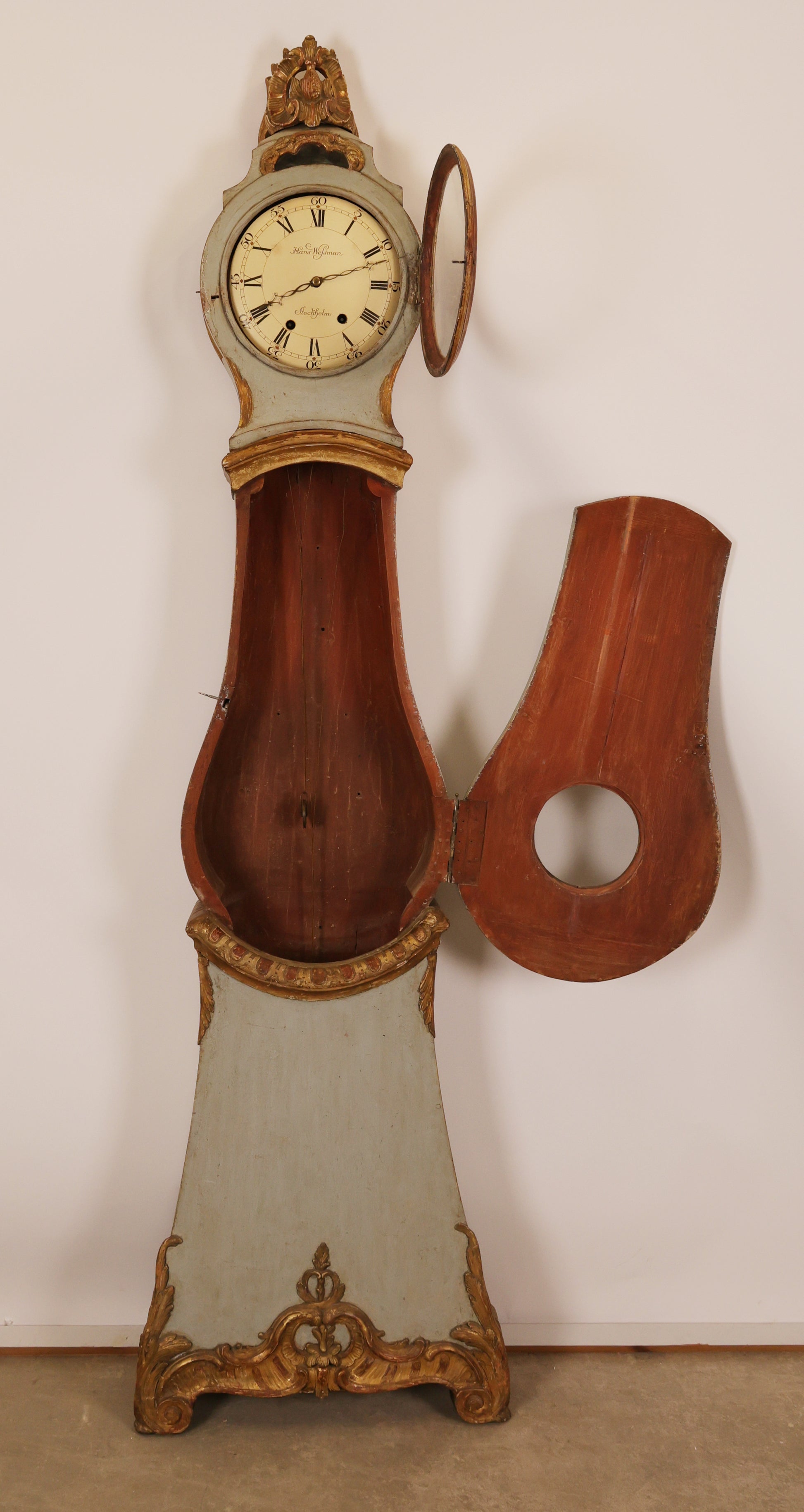 Opened 18th Century Rococo Grandfather Clock signed Hans Wessman with rich gilded carvings in typical Rococo forms.