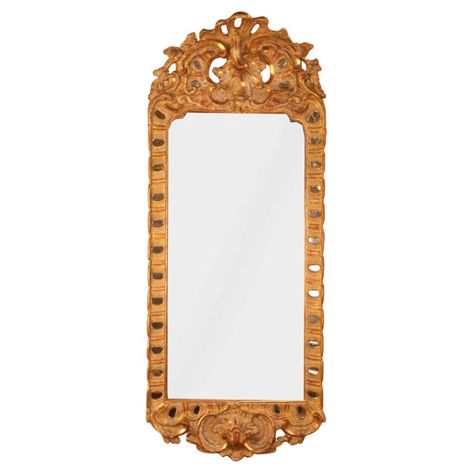 A gilded Rococo mirror from the 18th century.
