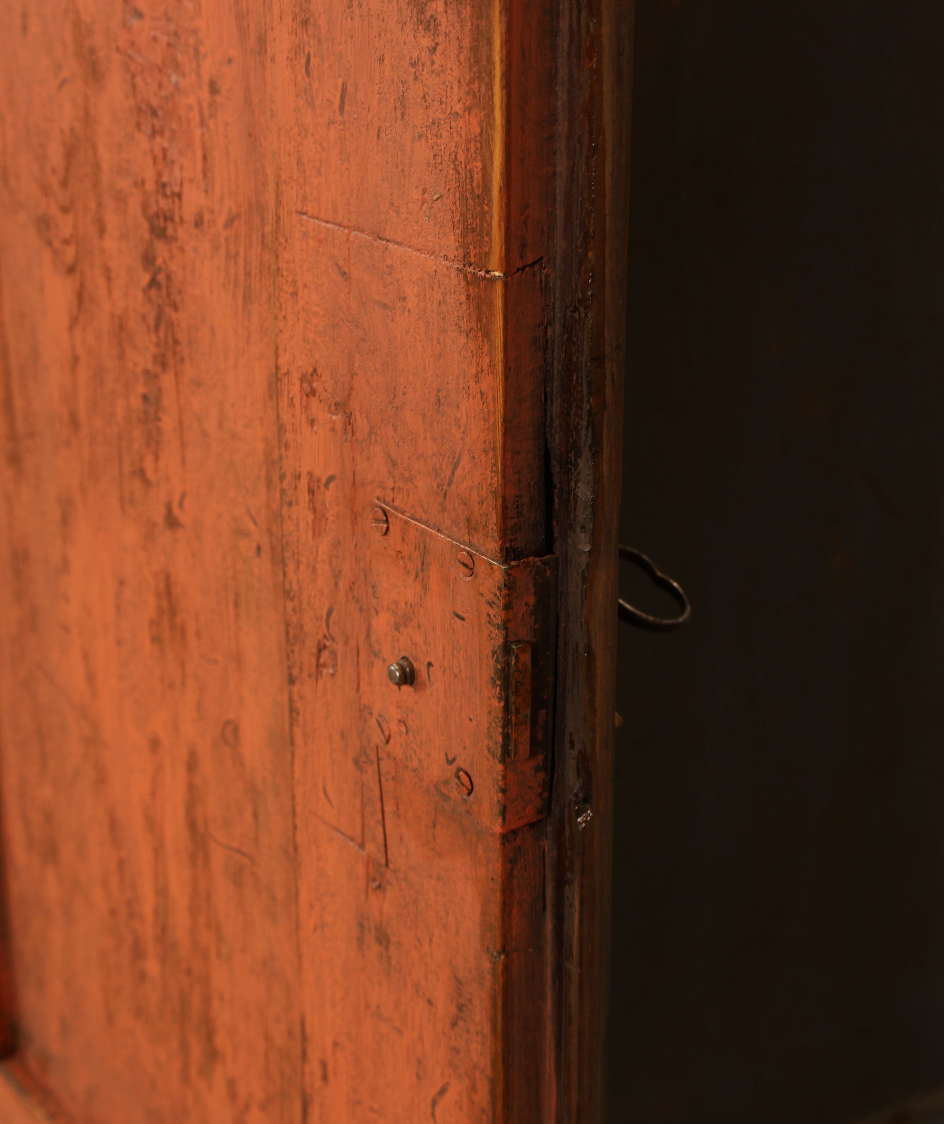A detail on the door of a Rococo cabinet.