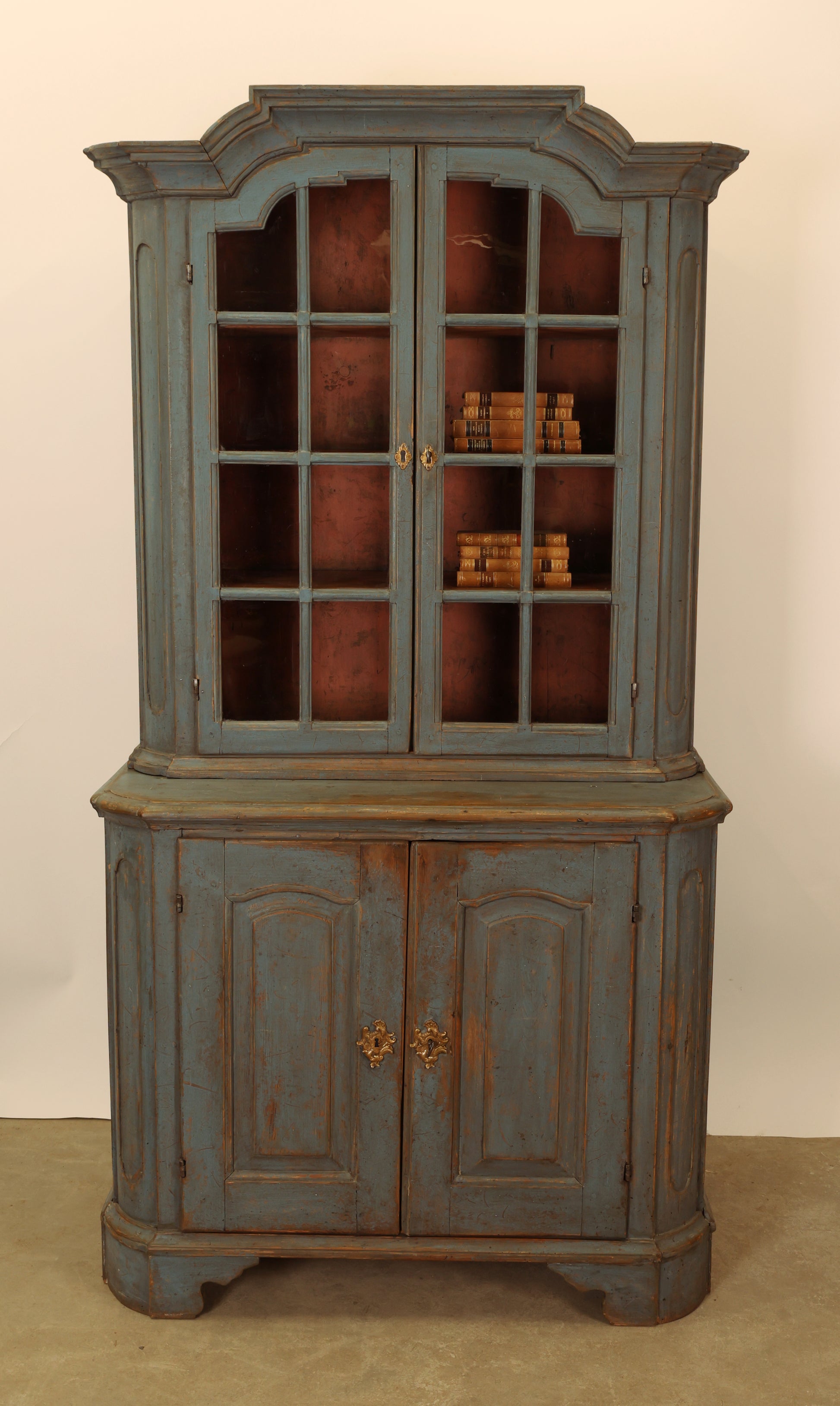 A rococo display cabinet for sale.