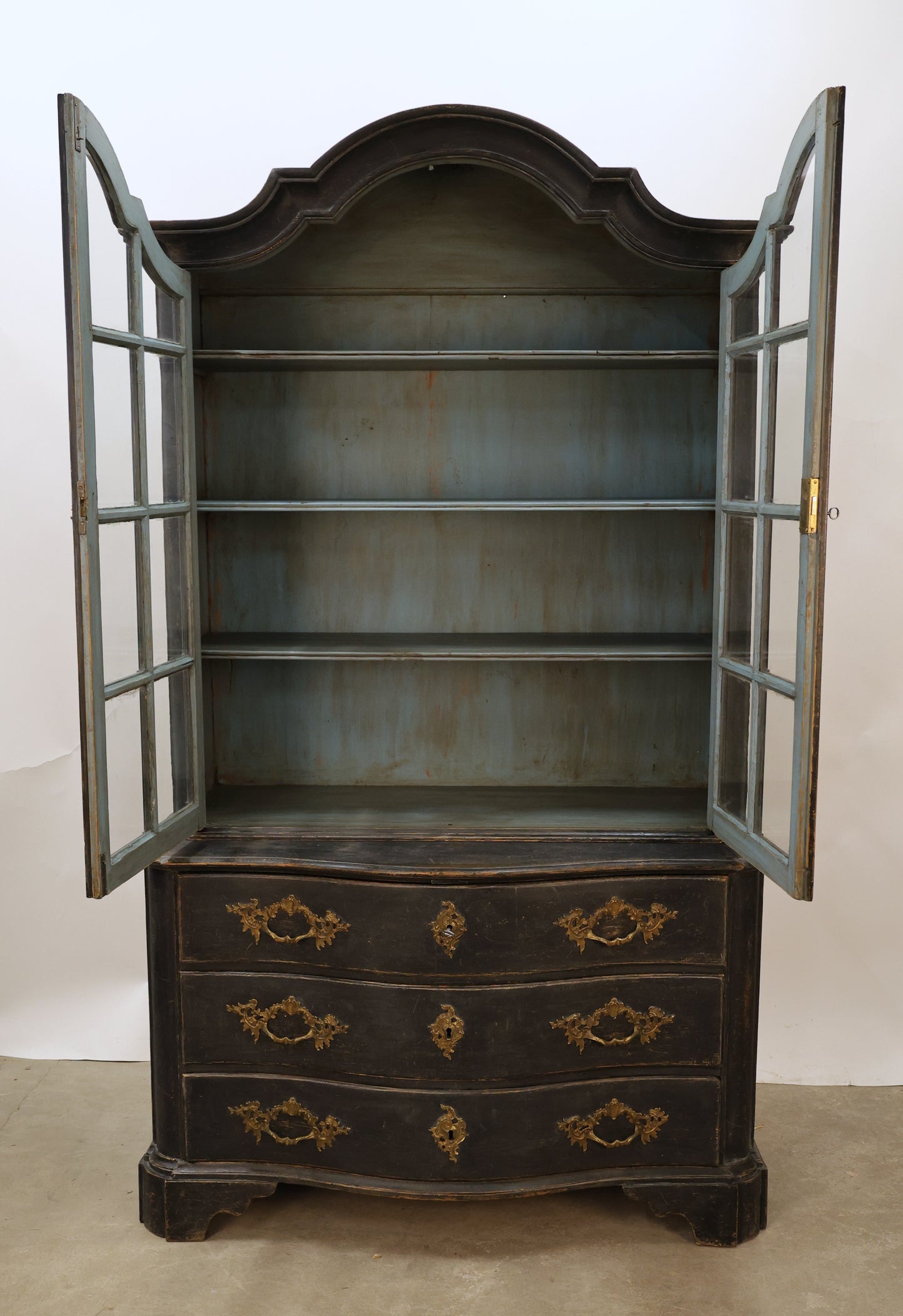 Opened display cabinet from the Rococo epoch.