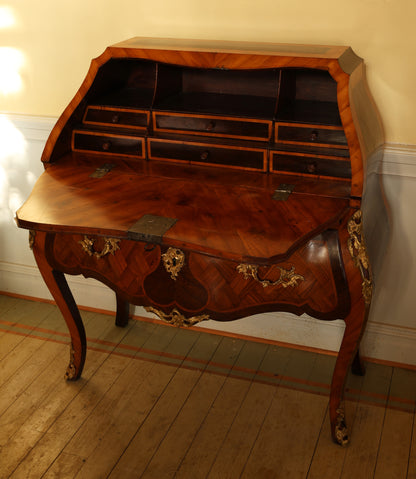 A Rococo secretary for sale.