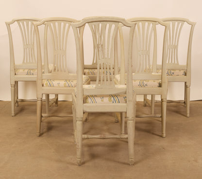 Backview of six gustavian chairs.