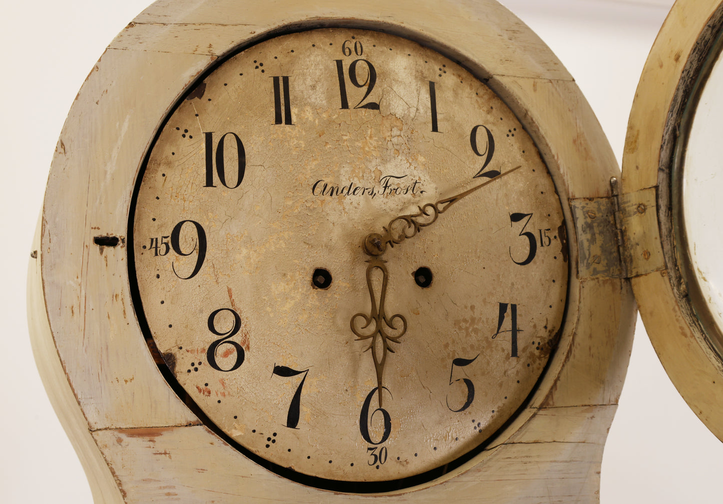 The movement on a Swedish antique column grandfather clock.