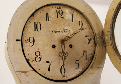 The movement on a Swedish antique column grandfather clock.