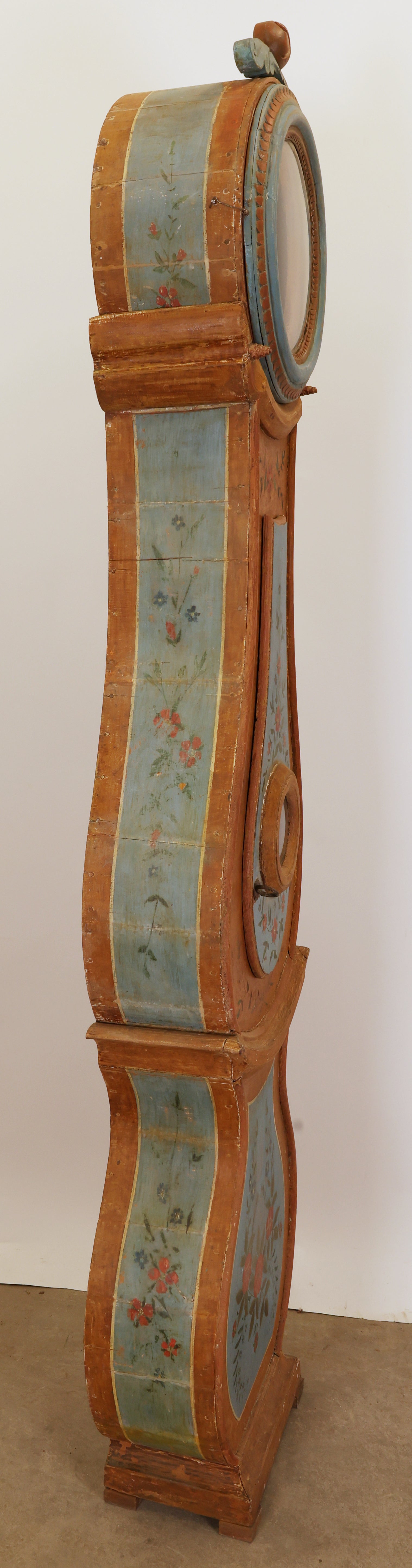 A painted Swedish antique longcase clock.