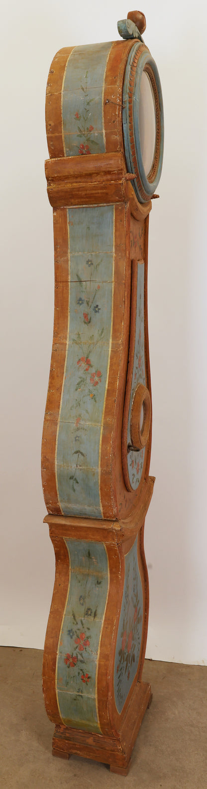 A painted Swedish antique longcase clock.