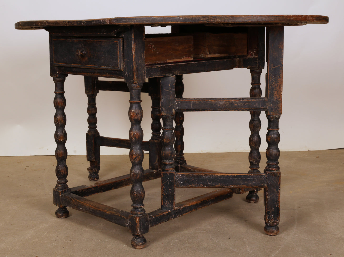 A Swedish antique Baroque gateleg table.