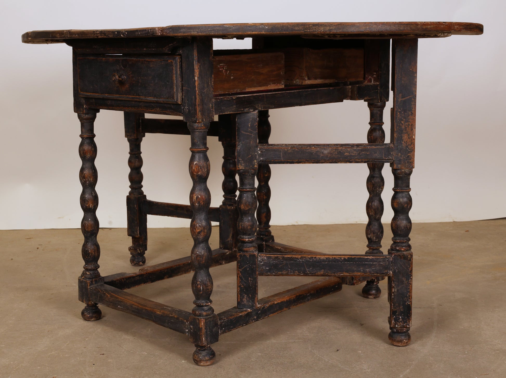 A Swedish antique Baroque gateleg table.