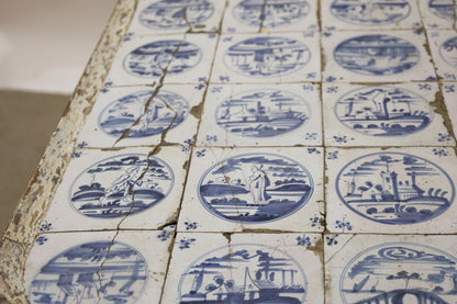 Close up of an antique tile table.
