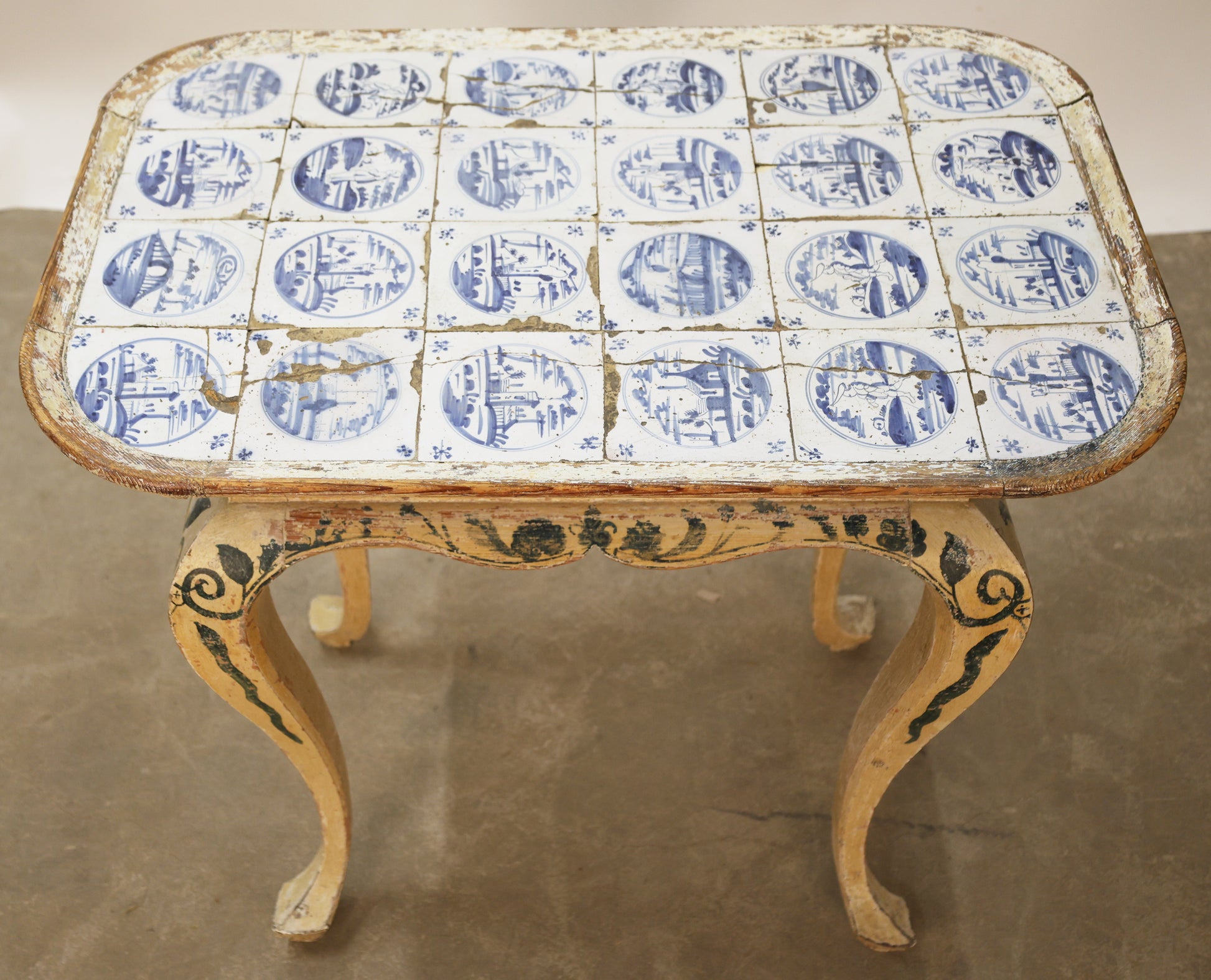 Antique furniture, a tiled table for sale.