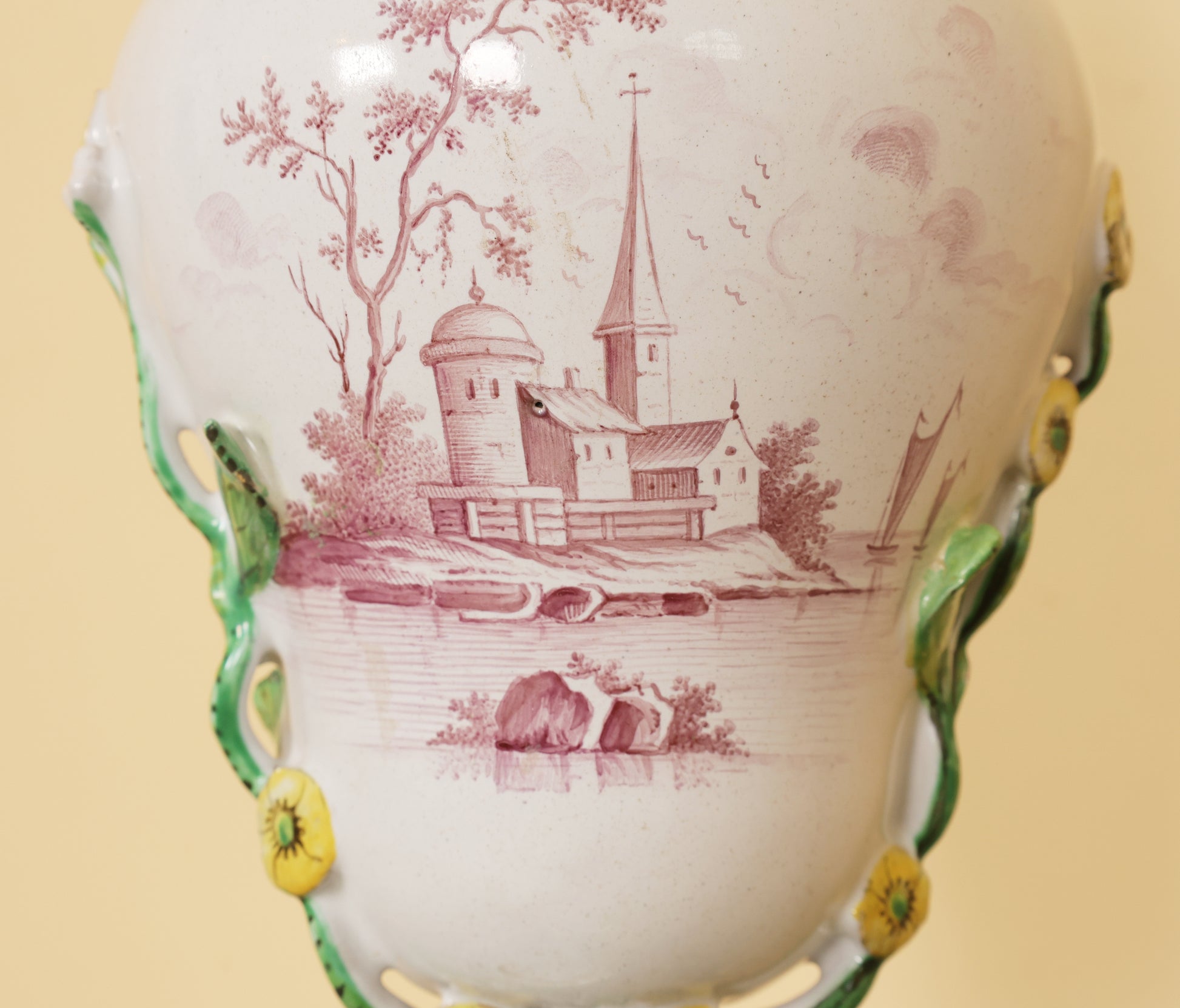 18th Century Faience Vase showing the painted part depicting a building and a tree on an island in red color