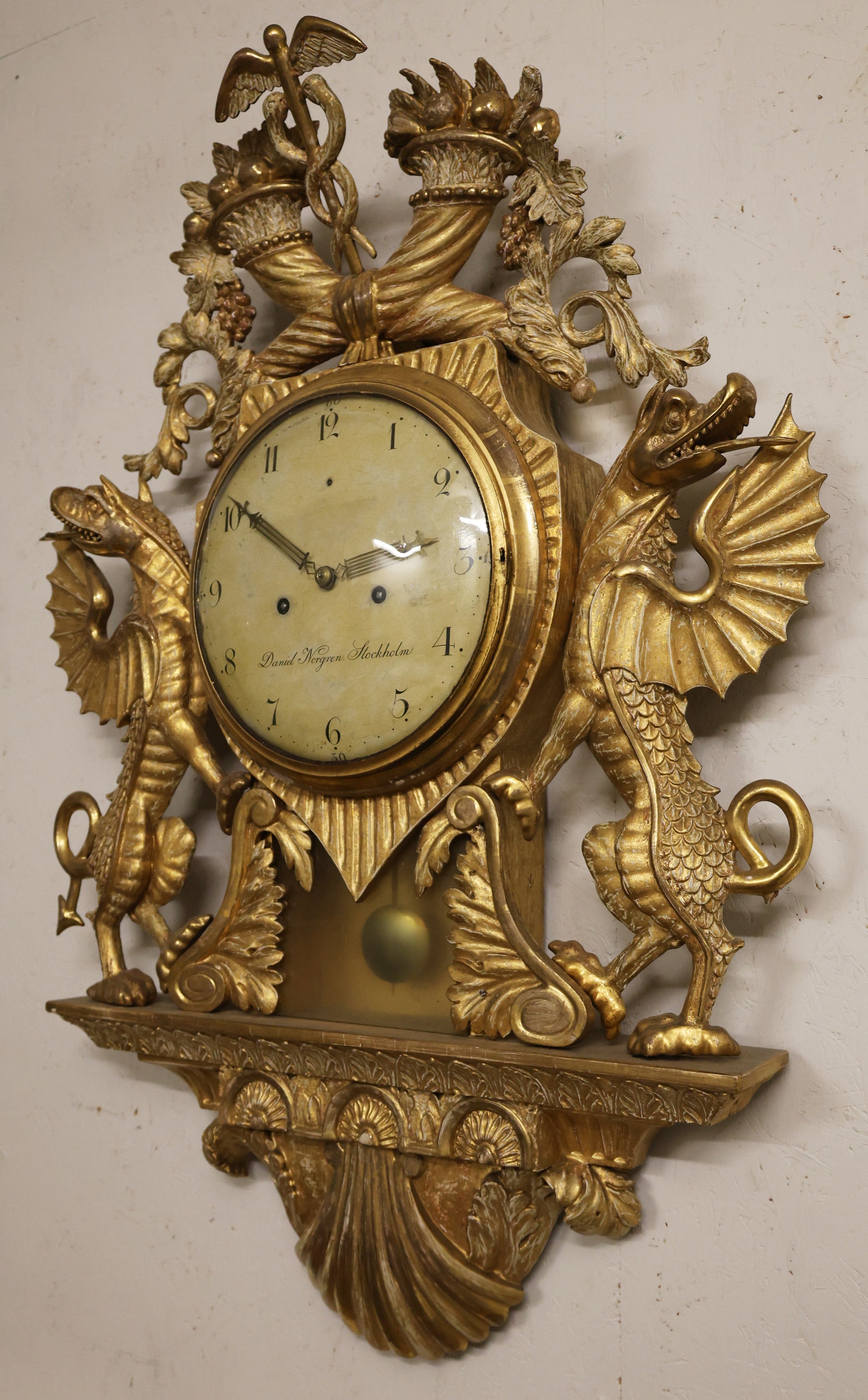 An Empire wall clock made by Daniel Norgren.