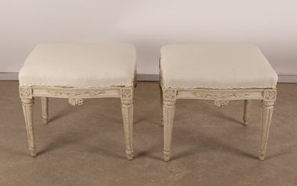 Above view of Pair of 18th Century Gustavian Stools signed Johan Erik Höglander with carved decorations of grapes, branches and corner rosettes. The legs are carved with flutings. 